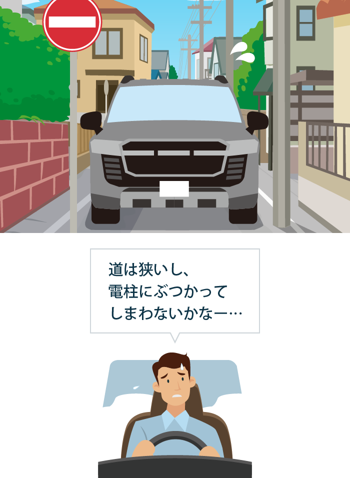 狭い一方通行を通行しようとする大きなSUV